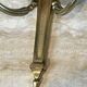 Pair of Louis XVI style bronze wall sconces