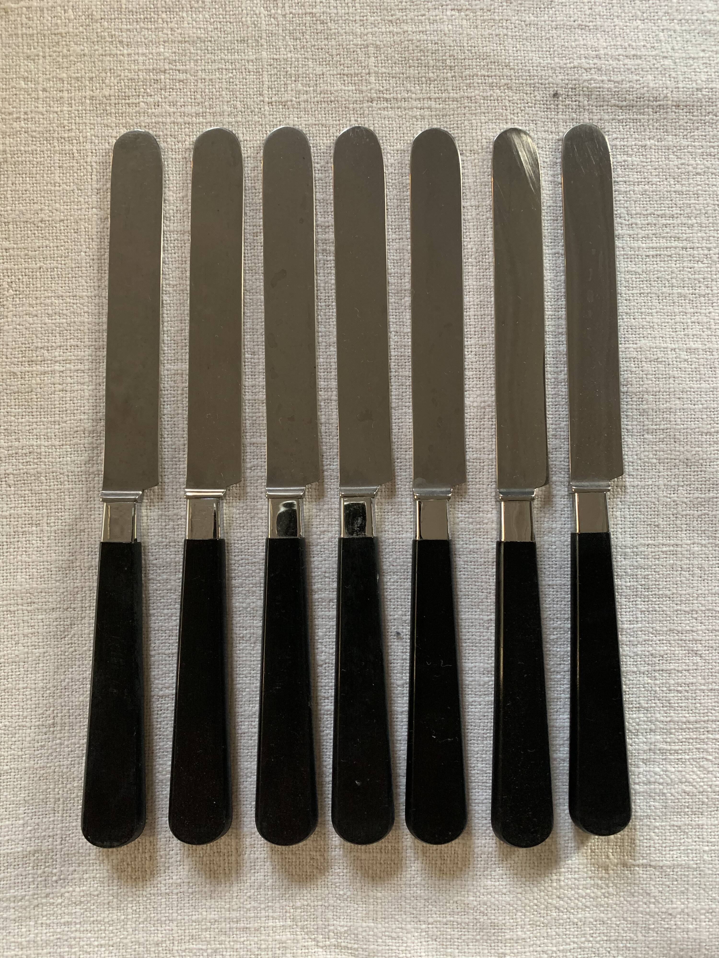 Batch of black cheese knives