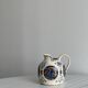Hand painted ceramic decorative pitcher