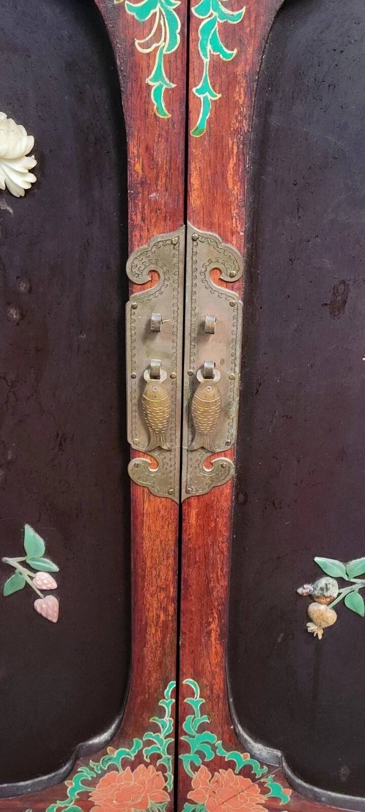 Asia, 20th century: Lacquered cabinet decorated with vases of flowers in hardstone