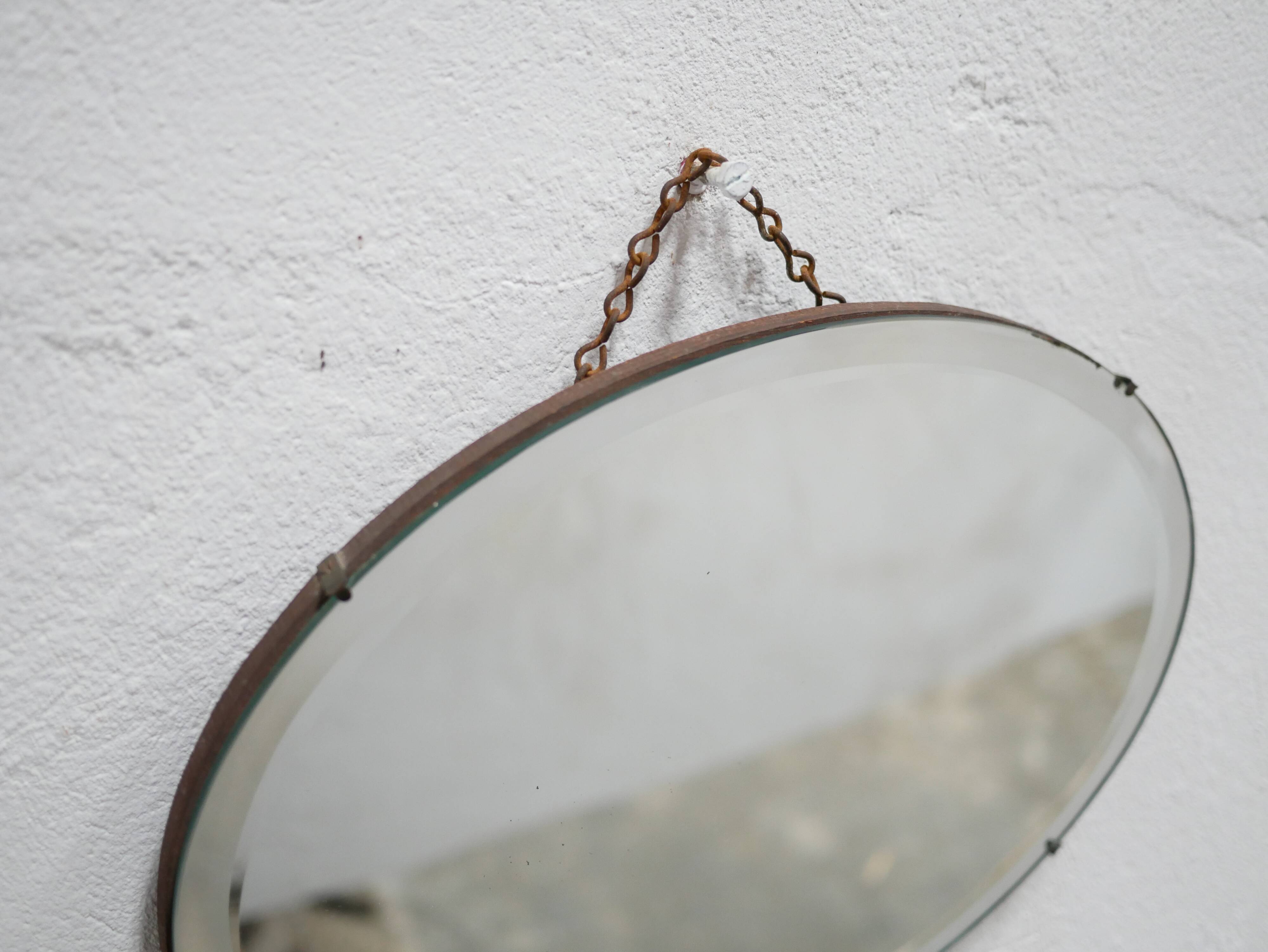 Vintage art deco bevelled oval mirror