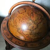 Rolling globe bar