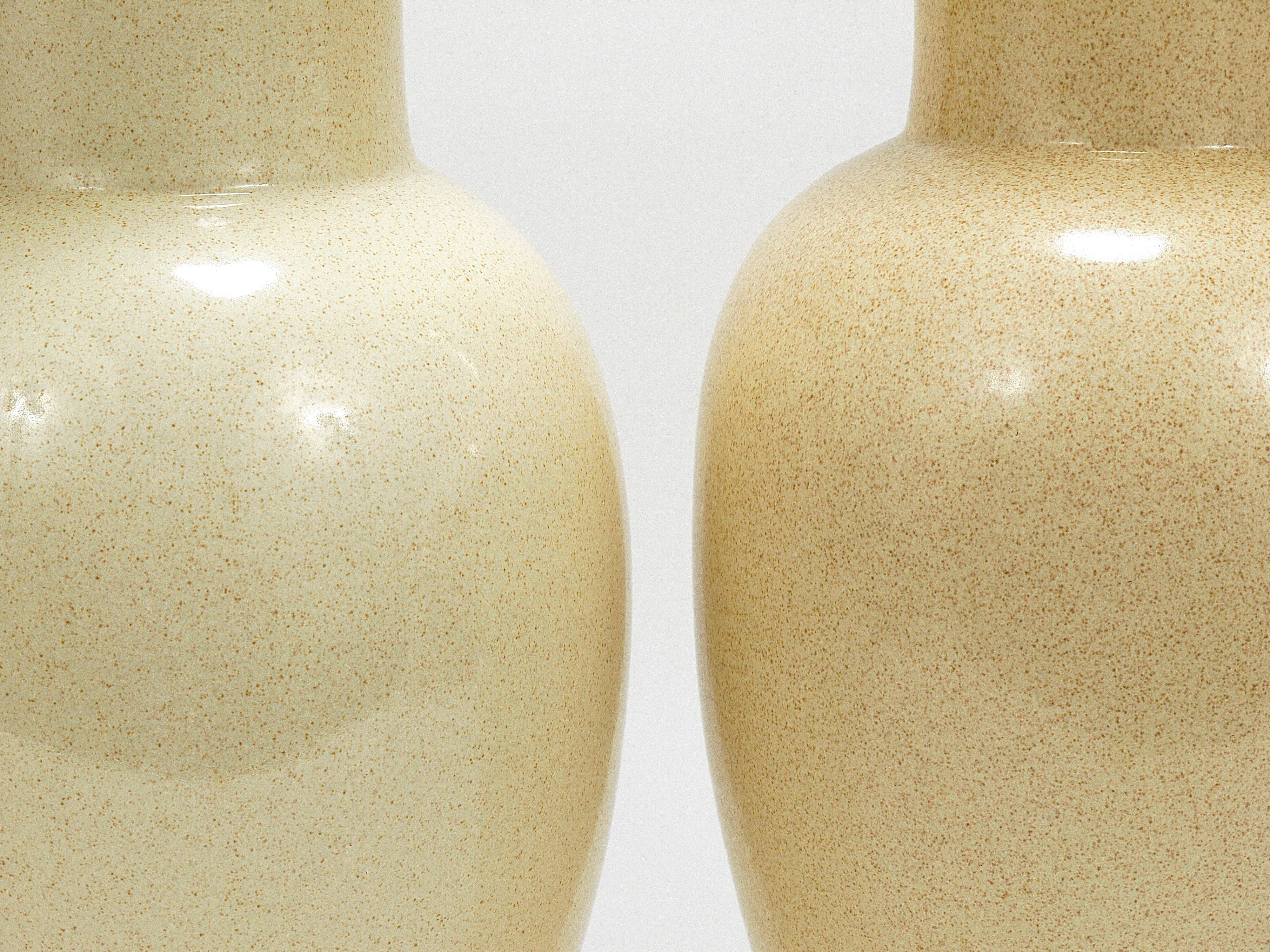 Pair of Tommaso Barbi Riviera palm tree table lamps from the 1970s with matching cushions.