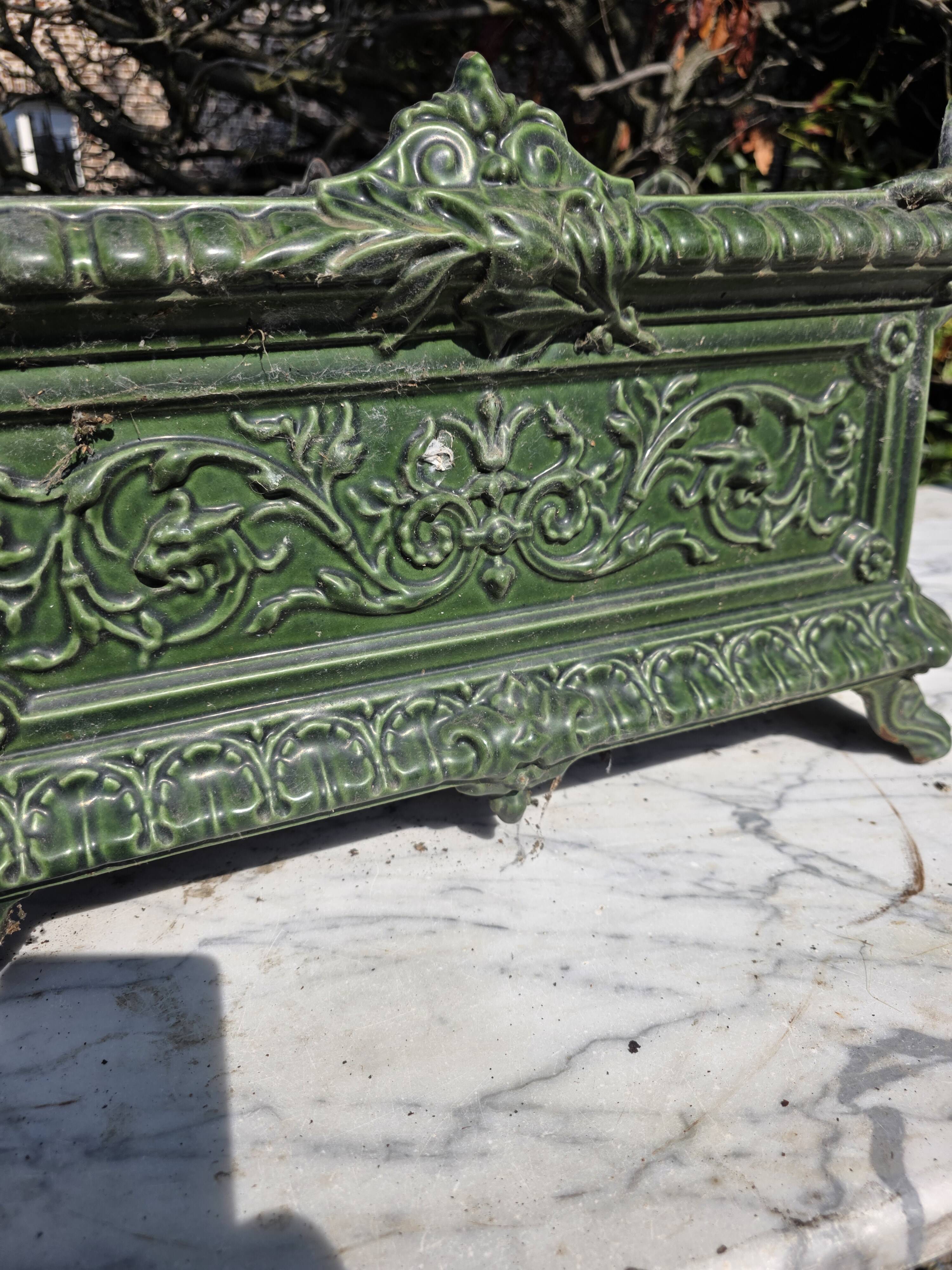 Antique enamelled cast iron planter in the Napoleon III style.