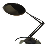 Aluminor brand articulated lamp, in black metal. 1960.