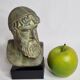 Bust of Poseidon in patinated plaster on wooden base