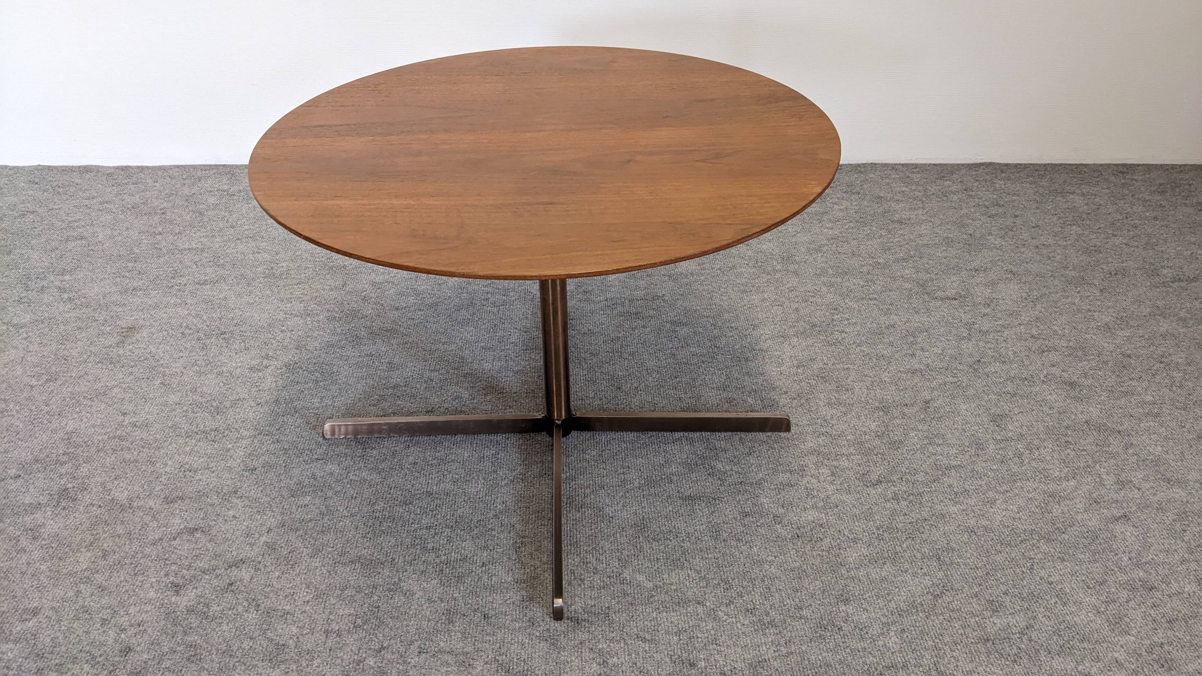 Contemporary round side table or end table.