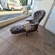 Chesterfield armchair with folding footrest