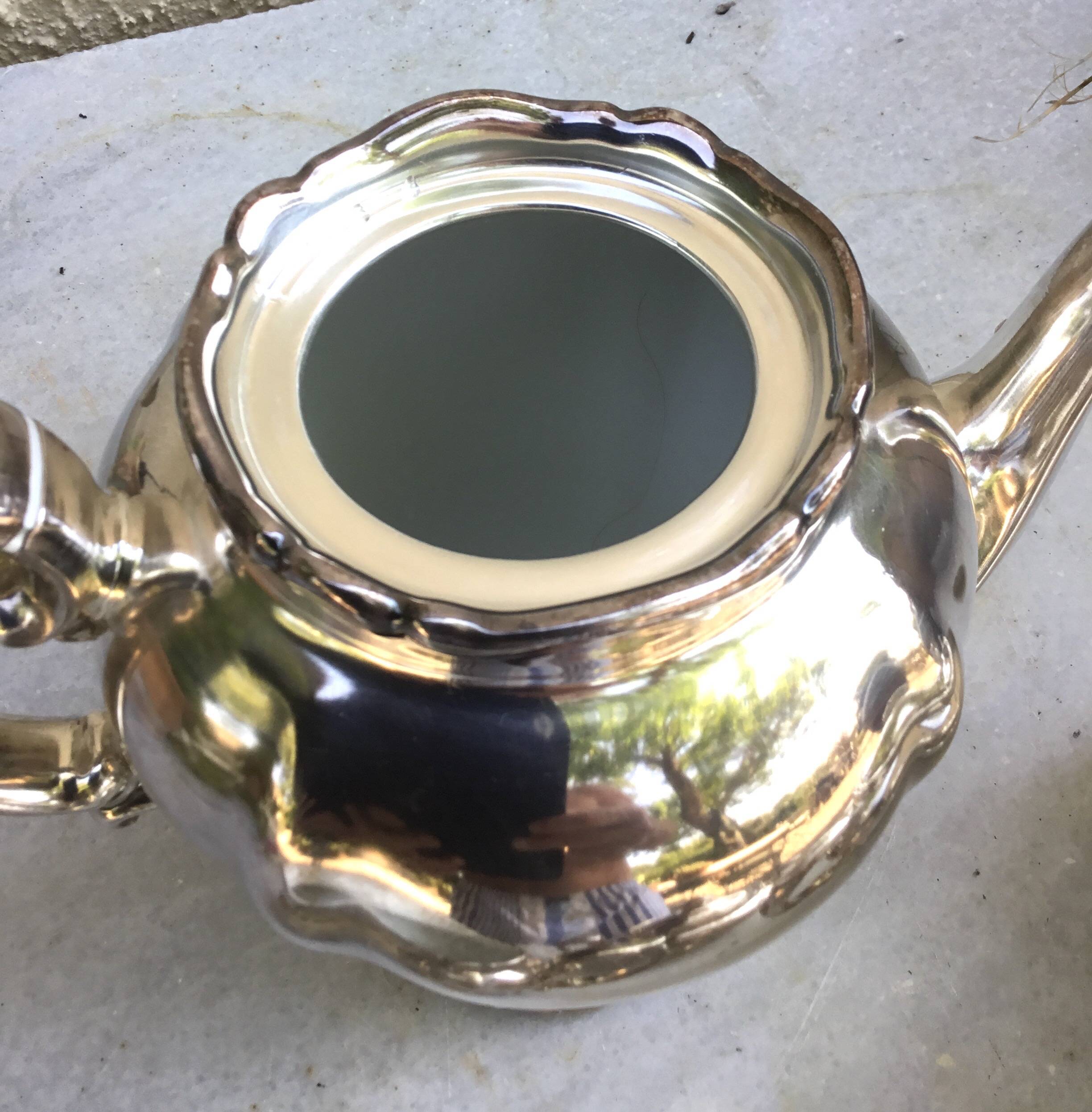 Tea and coffee service in porcelain and silvered enamel.