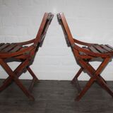 2 wooden folding chairs