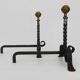 Large pair of wrought iron and brass ball fireplace andirons. 19th century