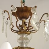 French Louis XV chandelier with 8 lights in gilded bronze, glass and crystal.