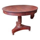 Round table with central tripod leg