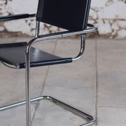 Pair of Bauhaus cantilever armchairs in chromed metal and leather, 1970
