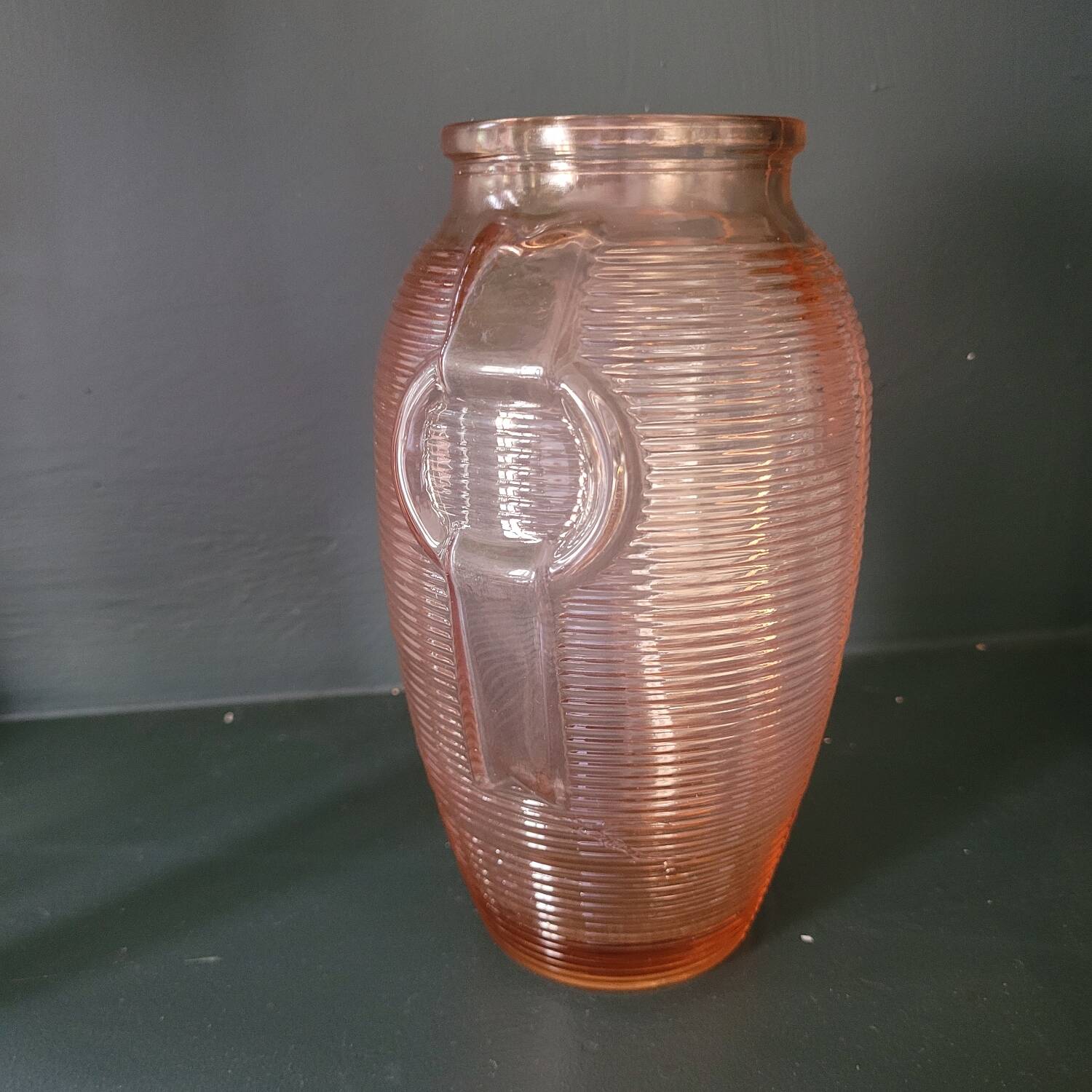 Salmon-colored Art Deco pressed glass vase