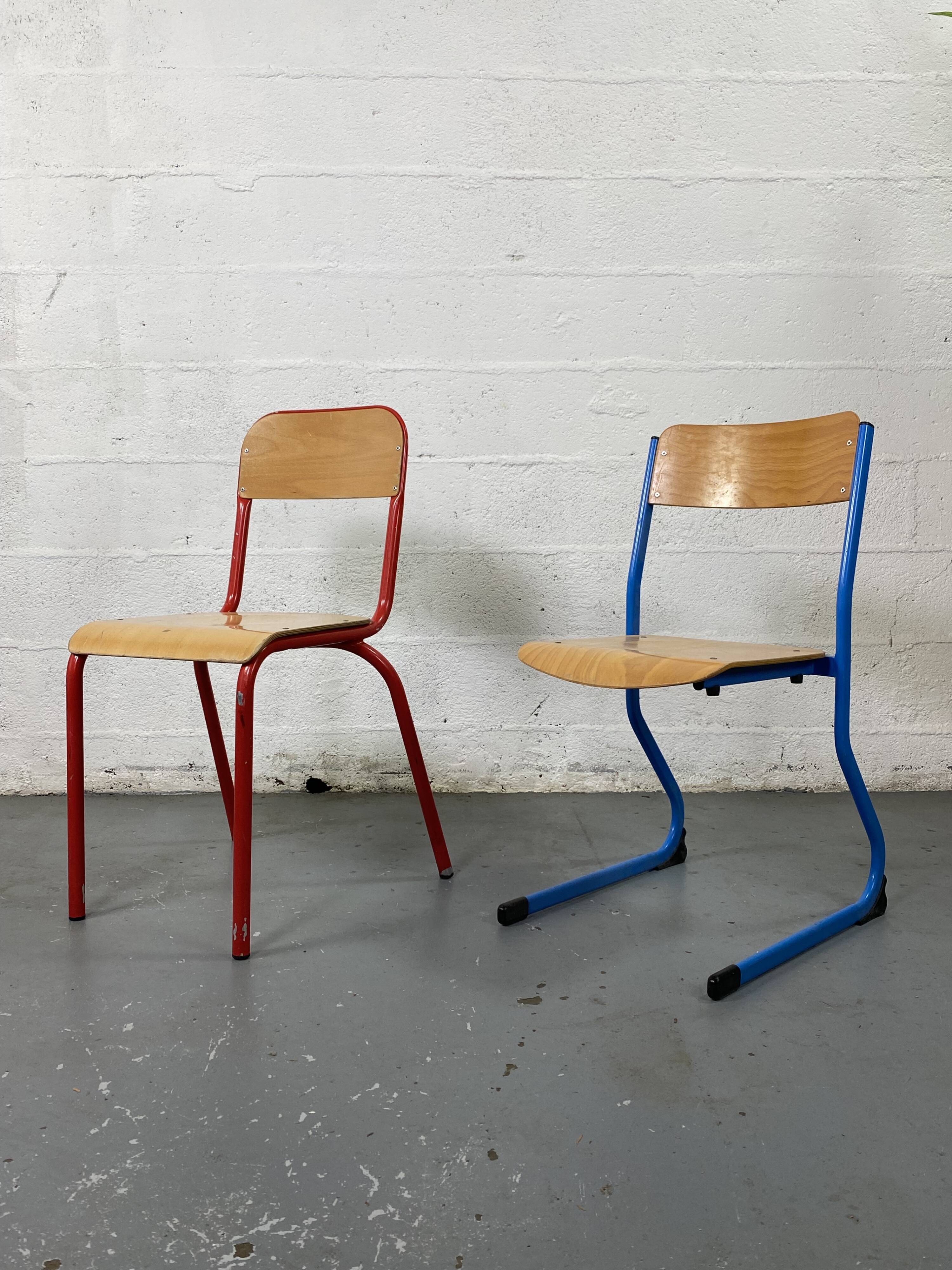 Set of 2 mismatched industrial school chairs