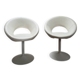 Pair of vintage white swivel armchairs in tulip style.