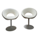 Pair of vintage white swivel armchairs in tulip style.