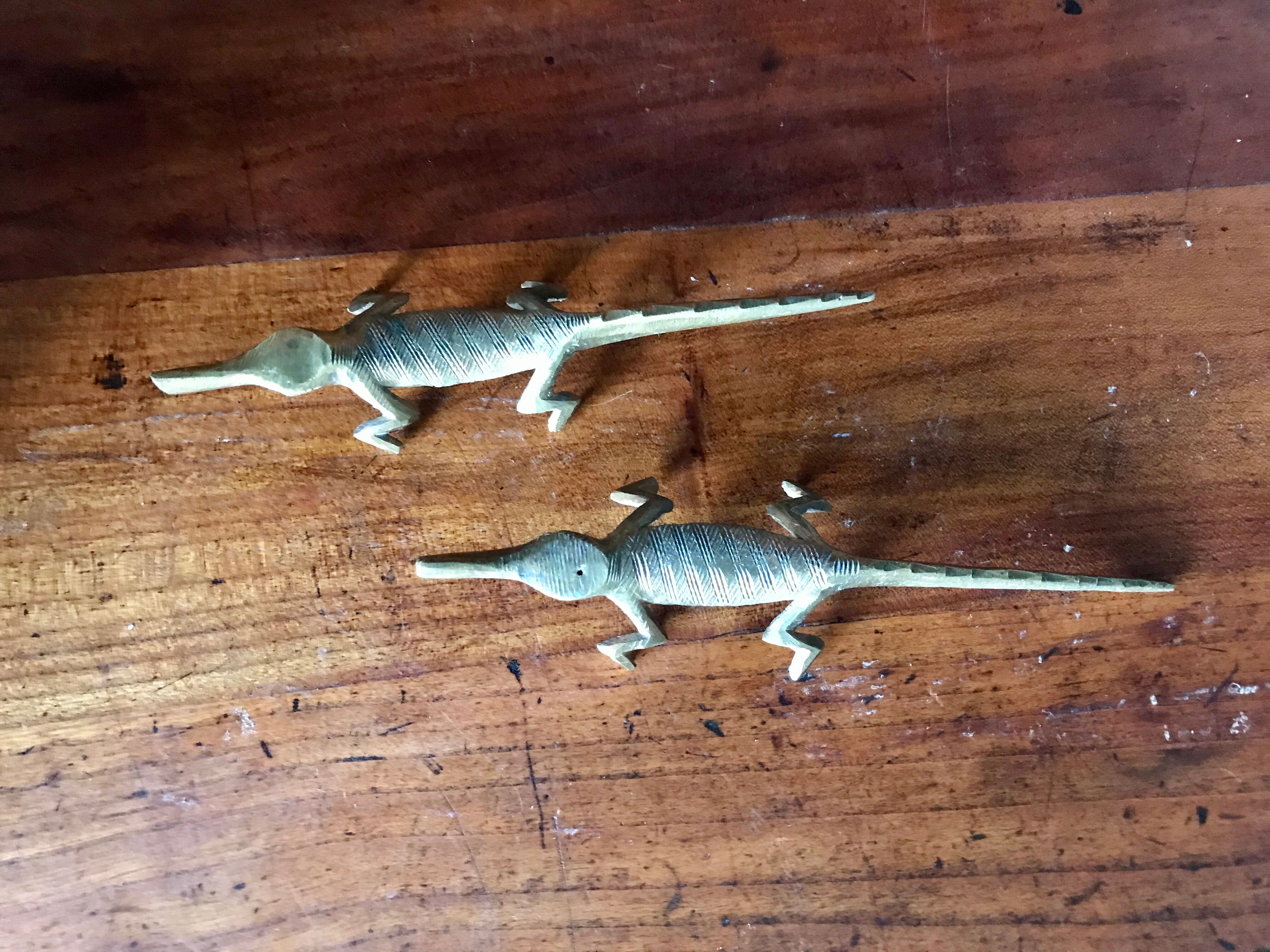 Couple of brass alligators