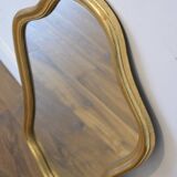 Golden mirror in wood and gold leaf