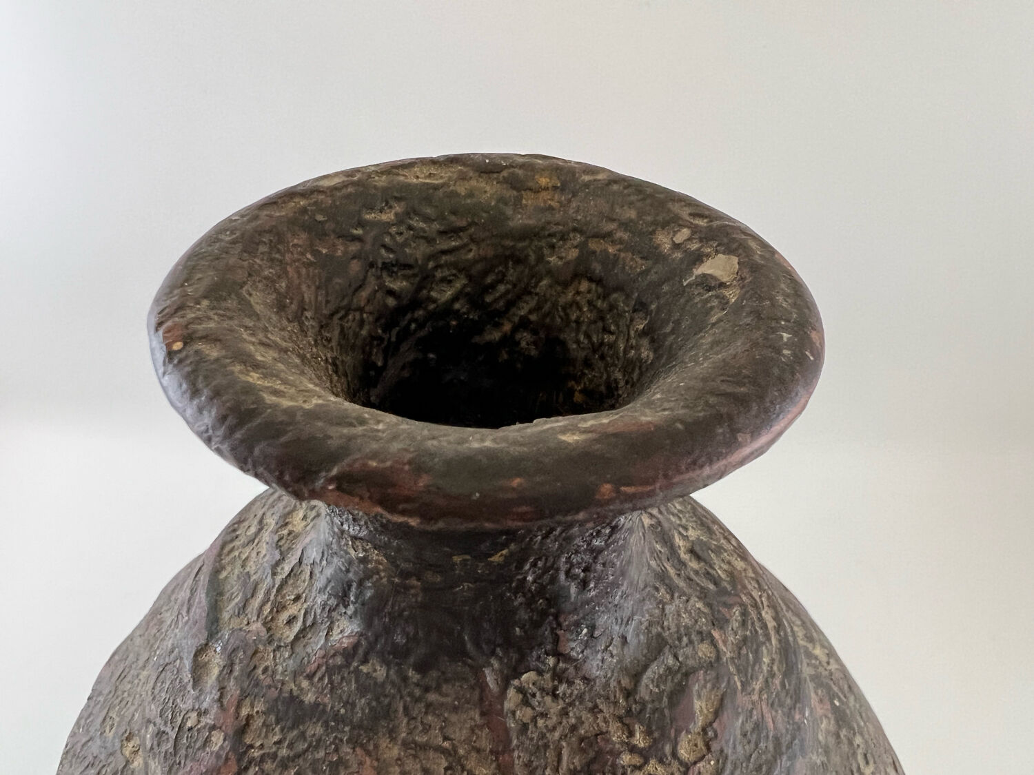 Iridescent black ball vase