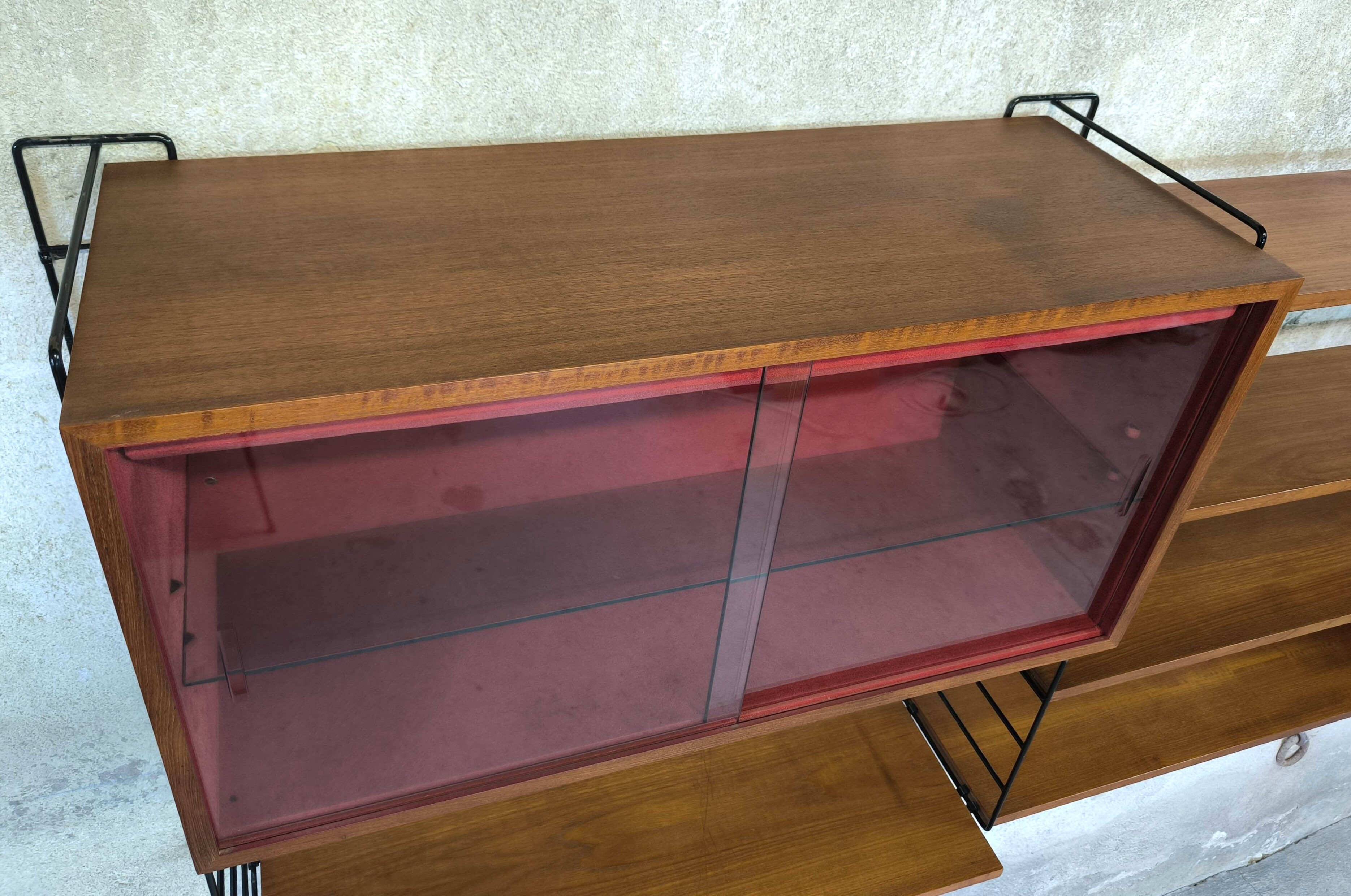 Modular vintage wall unit in teak.