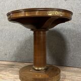 Art Deco pedestal table in mahogany and gilded bronzes around 1920