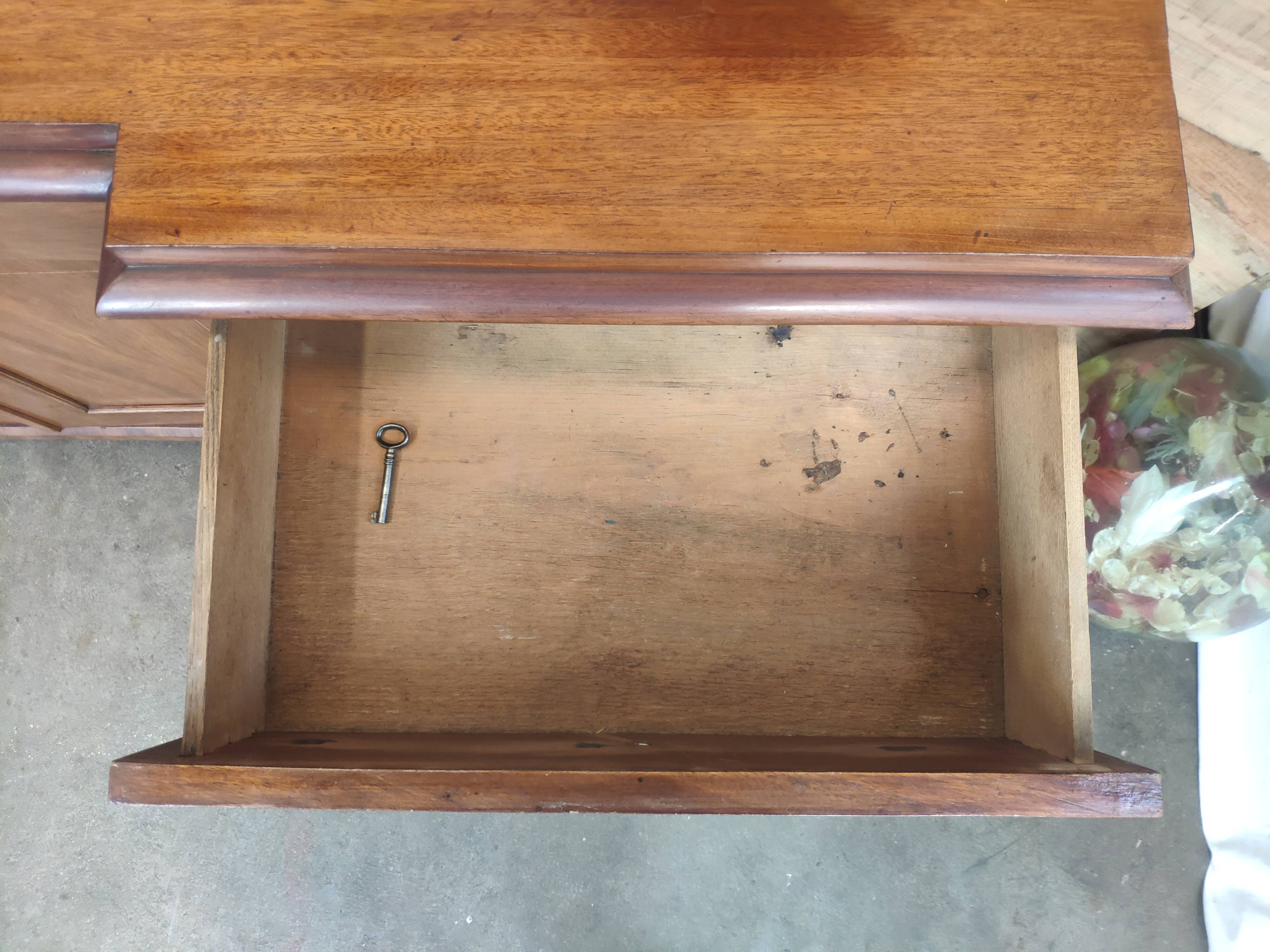 Walnut 4-door lion head sideboard