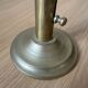 Old brass pull candle holder