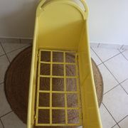 Yellow vintage baby cot