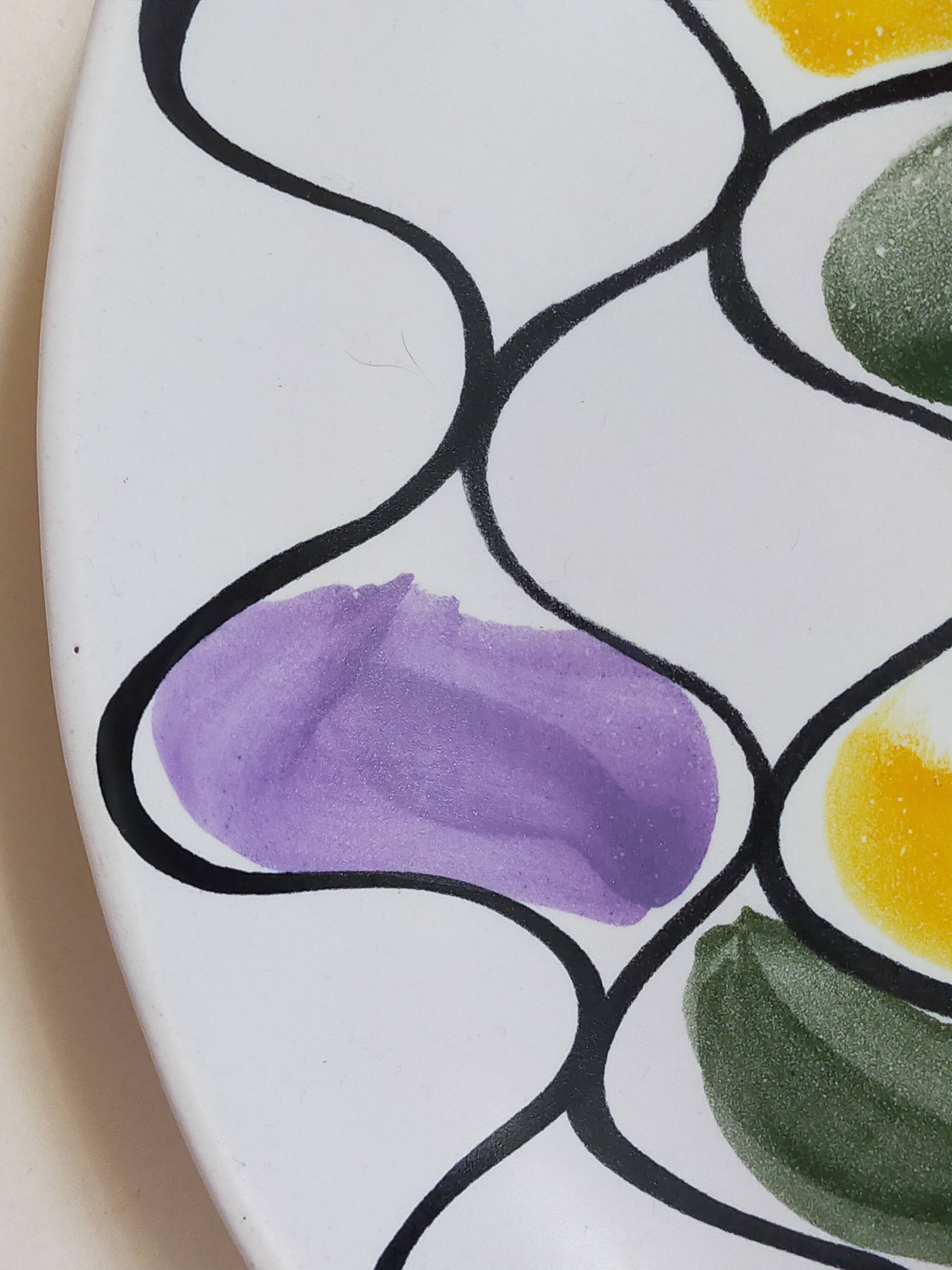 Three vintage free-form ceramic ravine dishes from the 1950s