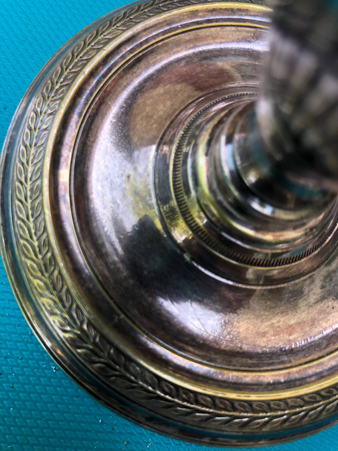 Pair of Louis XVI style candlesticks in silvered bronze