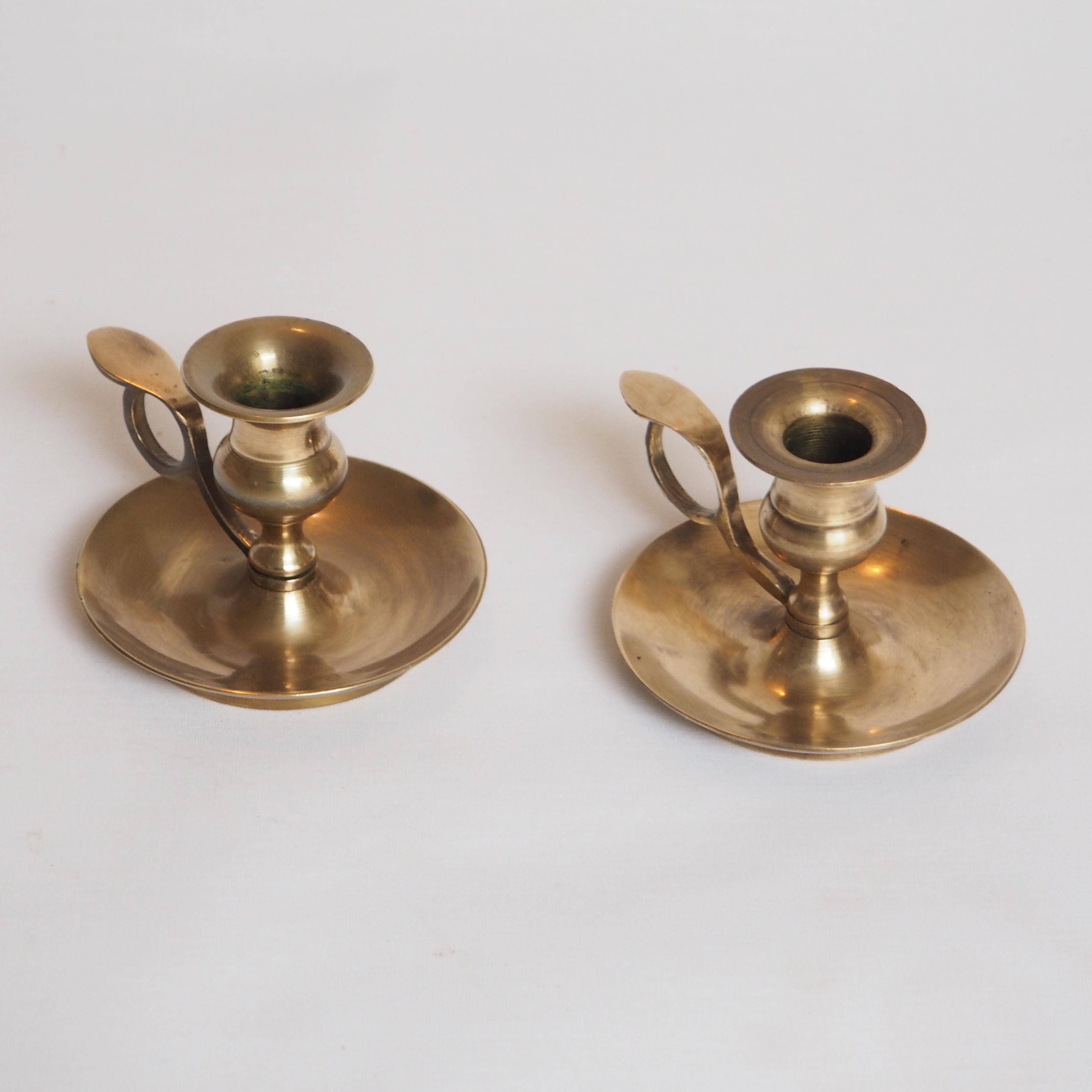 Brass candle holder with cup and handle