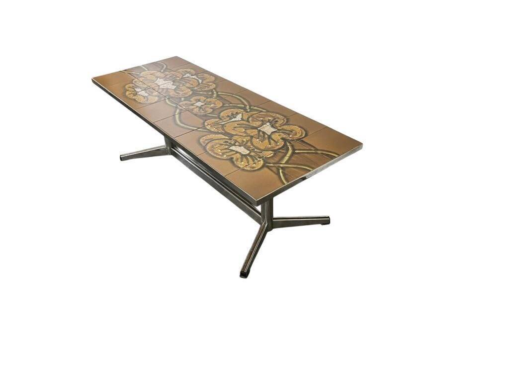 Vintage ceramic coffee table with a chrome frame.