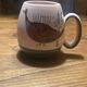 Set of two ceramic mugs signed Yvon ROY.