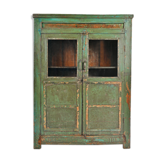 Glass cabinet with green patina