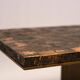 Coffee table with a pressed and engraved brass top by Illum Wikkelsø.