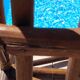 Vintage wooden garden furniture set with a bench and an armchair