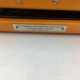 WE typewriter orange