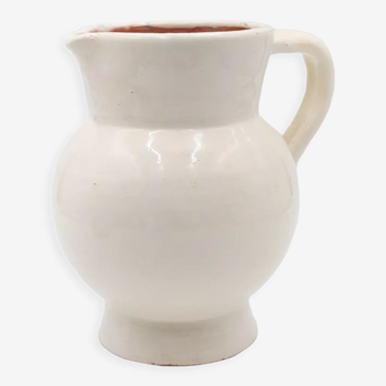 White pitcher in glazed stoneware