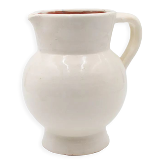 White pitcher in glazed stoneware