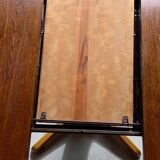 Table ronde vintage extensible en bois.