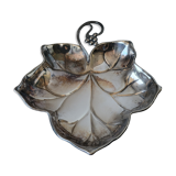 Old empty cut pocket in silver metal art nouveau in the shape of a sheet
