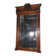 Bevelled mirror in carved wood