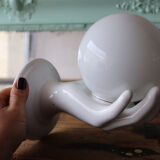 Antique wall light in ceramic – hand & globe