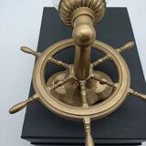 Brass wall sconces with nautical decor