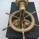 Brass wall sconces with nautical decor