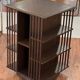 Rotating English library in wood veneer