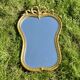 Large Louis XVI style beveled mirror in gilded painted wood - H: 78 cm - 1960