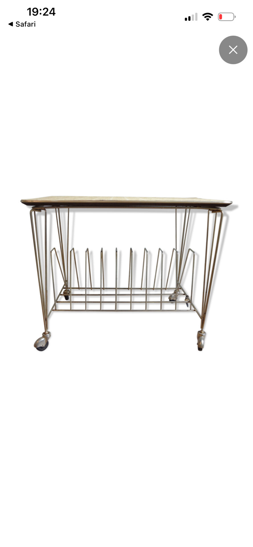 Rolling table for magazines or vinyl records.